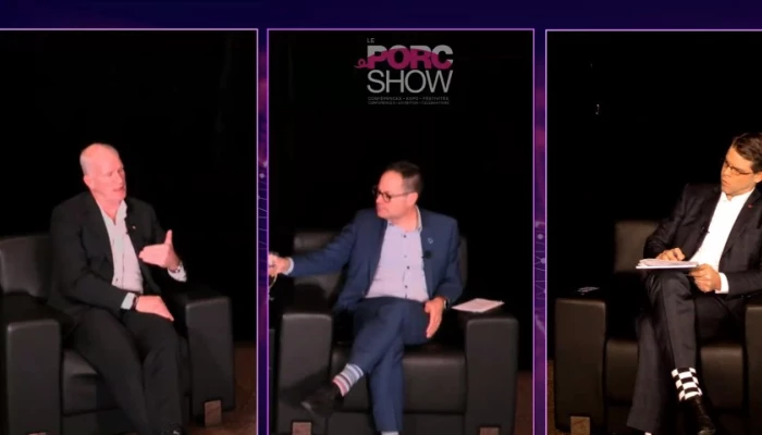 Richard Davies, Alexandre Cusson et Vincent Cloutier discutant lors du Porc Show.